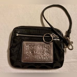 Coach Poppy wristlet small. Bundle 2 or more for 30% off.